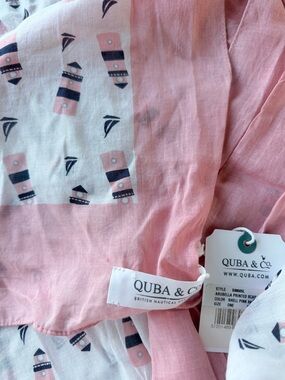 Quba & Co Arubella scarf features a lighthouse pattern and shell pink trim.  🇬🇧